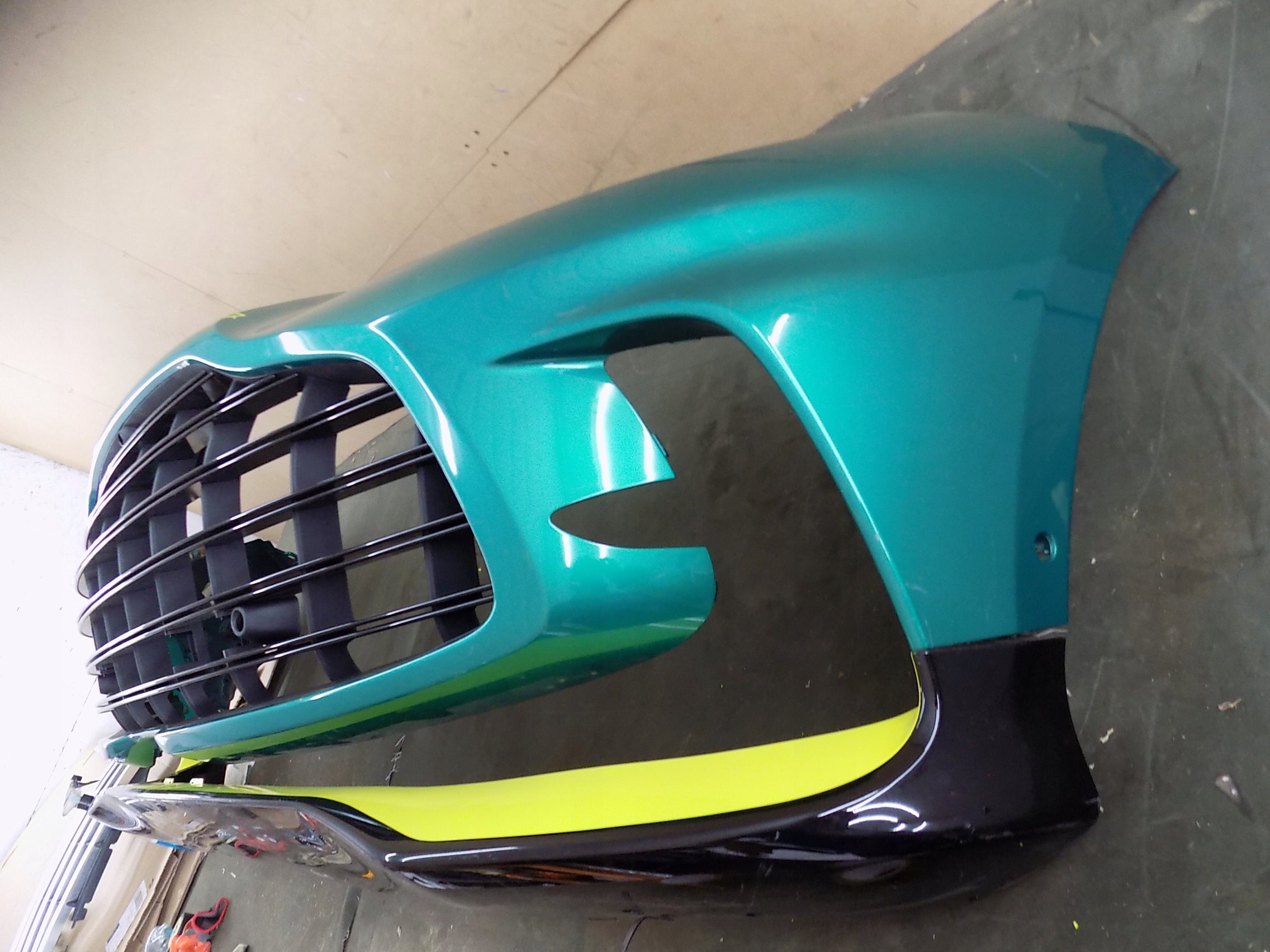 Aston Martin DBX 707 front bumper with lower spoiler, OEM, Part number: NY8317D957A