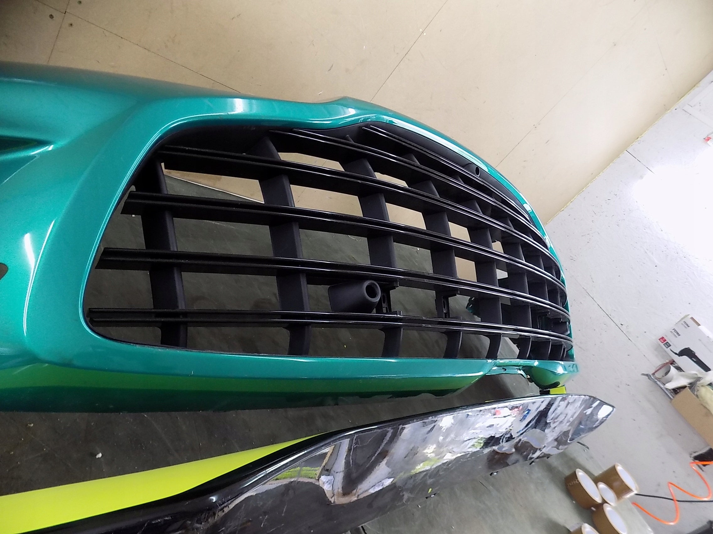 Aston Martin DBX 707 front bumper with lower spoiler, OEM, Part number: NY8317D957A