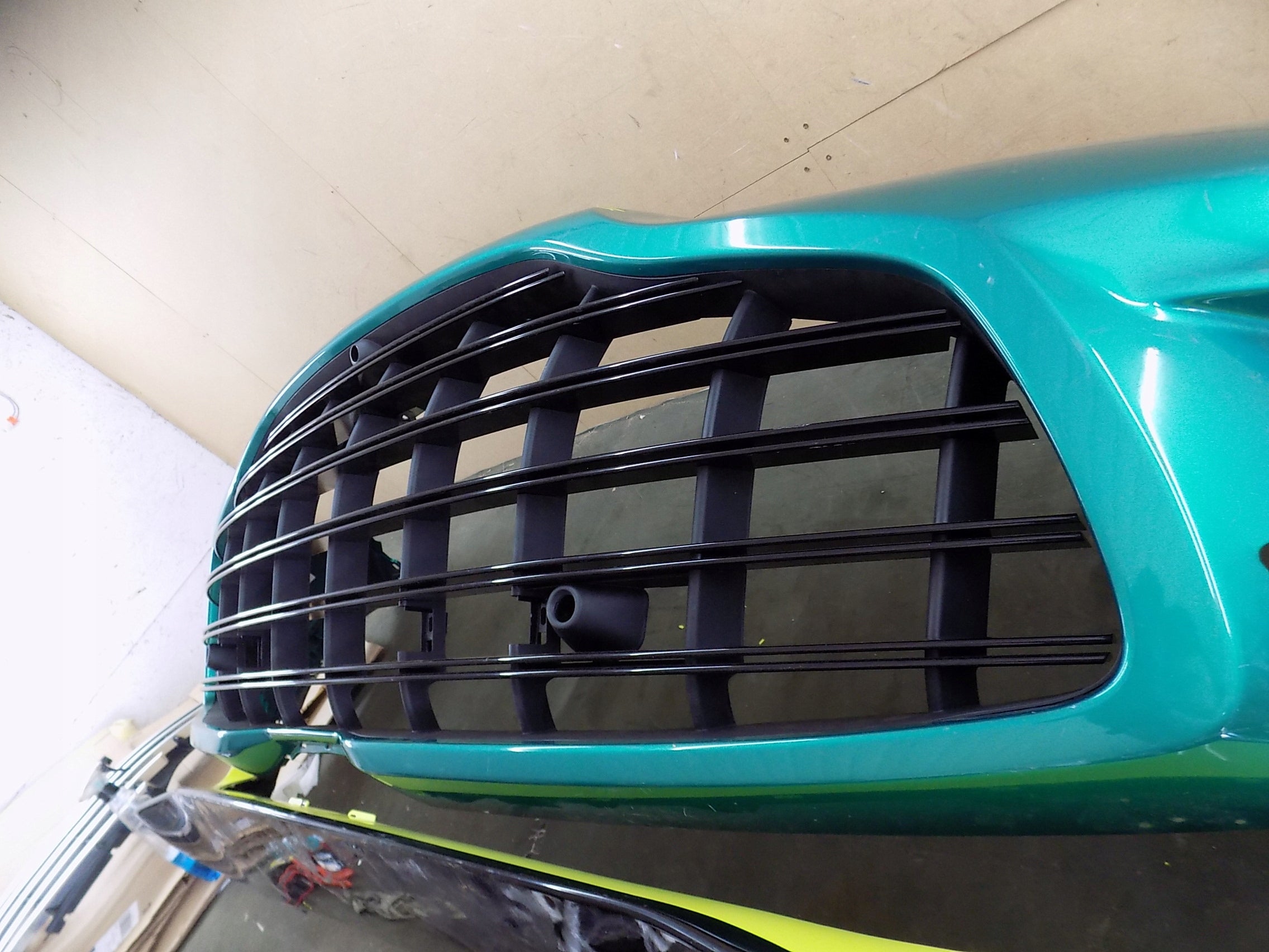 Aston Martin DBX 707 front bumper with lower spoiler, OEM, Part number: NY8317D957A