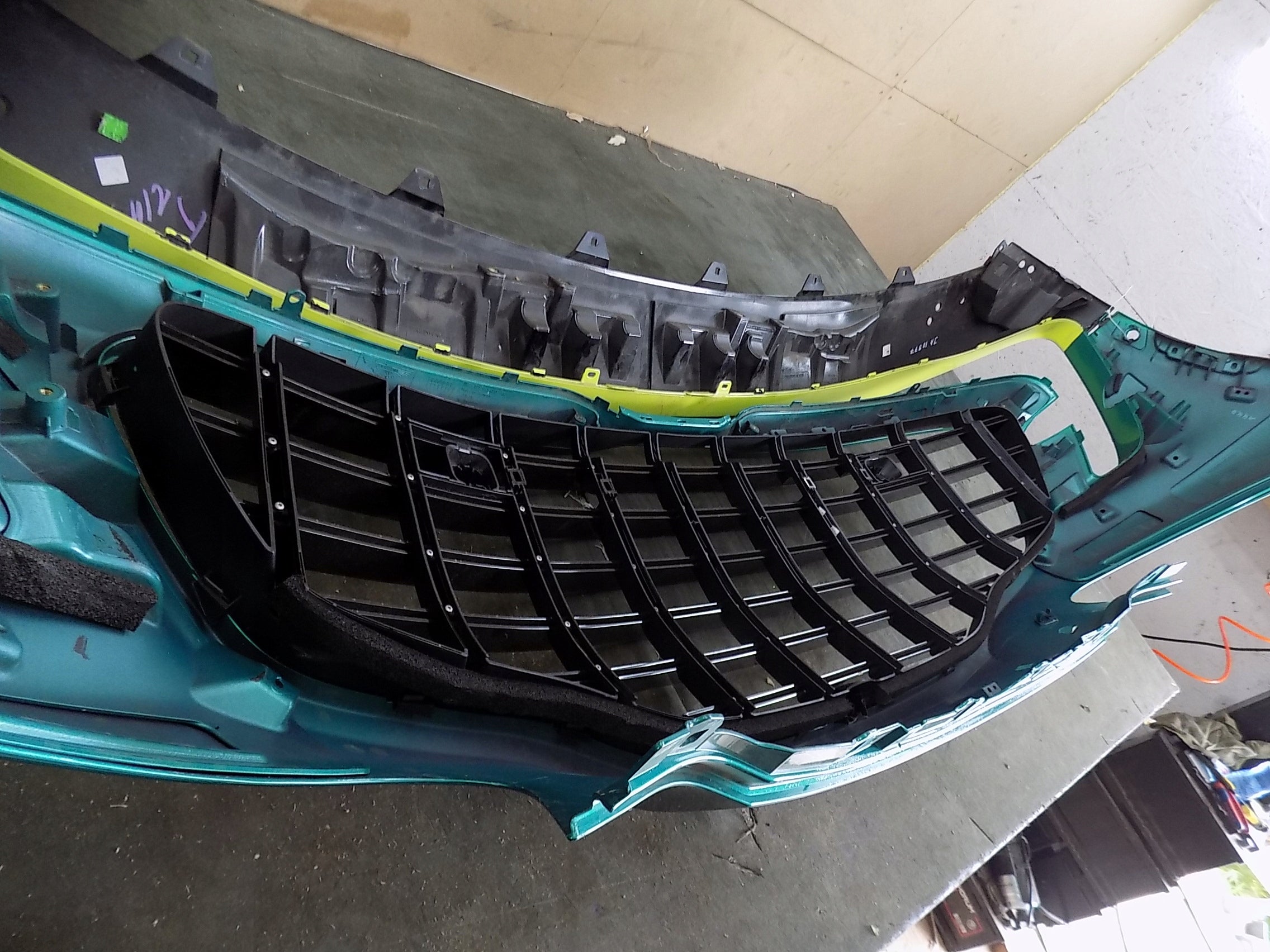 Aston Martin DBX 707 front bumper with lower spoiler, OEM, Part number: NY8317D957A
