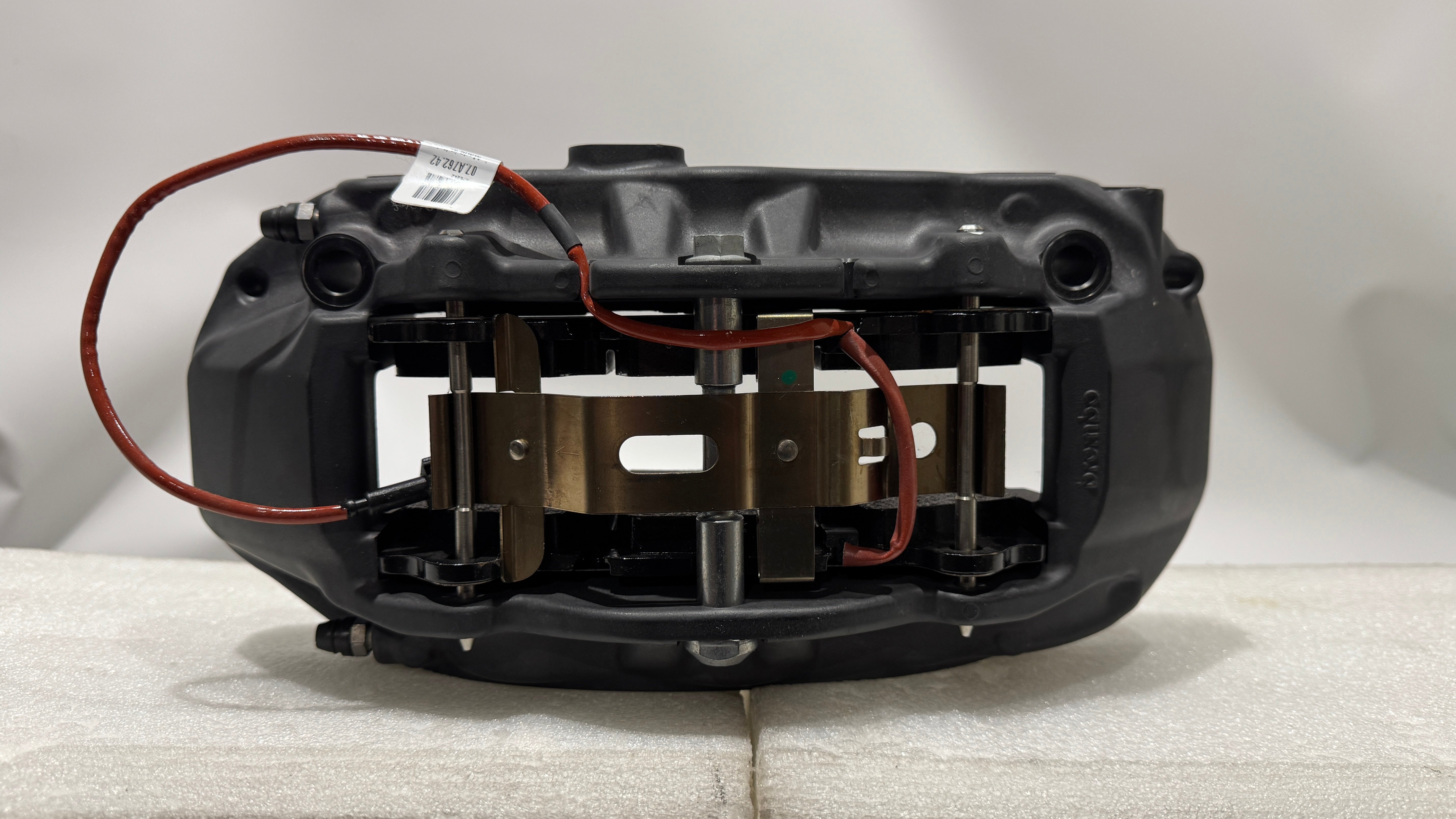 Ferrari 458, Portofino Caliper with brake pads L + R, OEM, Part number